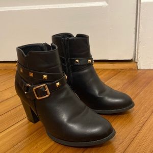 High heel boots with gold accents